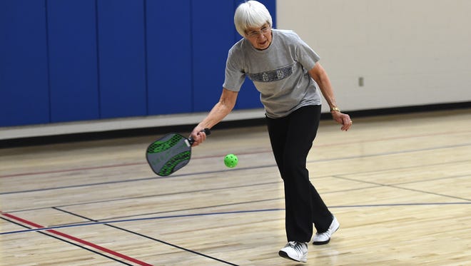 Lil Price plays pickleball at the Senior Center on Monday, March 28, 2016. 