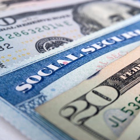 A Social Security card and cash