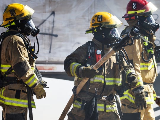 Phoenix firefighters battle a blaze on September 5,