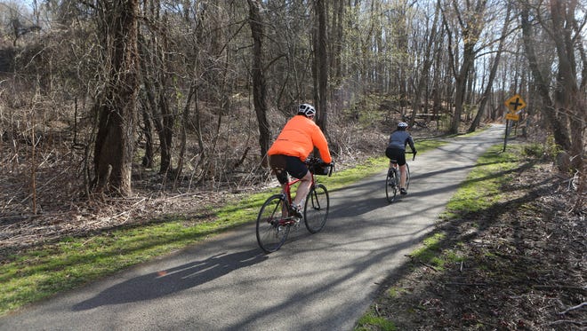 Cyclists enjoy the paths at the Tarrytown Lakes Park in Tarrytown, April 16, 2016. 