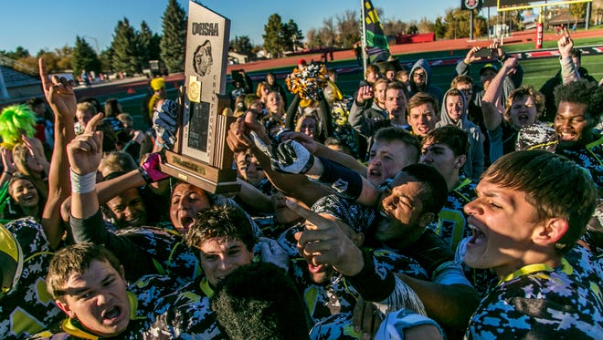 Diamond Ranch celebrates winning the 1A Championship, Saturday, Nov. 14, 2015. DRA won the state championship in football and basketball this school year.