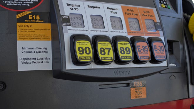 This July 11, 2012, handout photo provided by the Renewable Fuels Association shows a Lawrence, Kansas, fueling station pump with various grades of fuel, including E15, which contains 5 percent more ethanol than the current 10 percent norm sold at most U.S. gas stations. E15 is sold in just 20 stations in six Midwestern states, but could spread to other regions as the Obama administration considers whether to require more ethanol in gasoline; it's cheaper and cleaner but it could damage older cars and motorcycles. The American Petroleum Institute has asked the Supreme Court to block sales of E15. The Court could decide as soon as Monday, June 24, 2013, whether to hear the ethanol case. (AP Photo/Renewable Fuels Association, Robert White) ORG XMIT: WX601