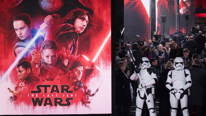Stormtroopers pose for photographers upon arrival at the premiere of the film 'Star Wars: The Last Jedi' in London, Tuesday, Dec. 12th, 2017.