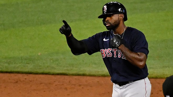 Red Sox center fielder Jackie Bradley Jr. reacts after doubling in a run during a game against the Miami Marlins last month. Bradley, known for his defense, has had a solid season at the plate this year, batting .279 with a .354 on-base percentage.