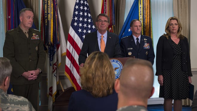 Defense Secretary Ash Carter introduces General David Goldfein, who was nominated to be Air Force chief of staff, second from right, Friday, April 29, 2016, during an event at the Pentagon. From left are, Joint Chiefs Chairman Gen. Joseph Dunford Jr. Carter, Goldfein, and Air Force Secretary Deborah Lee James.