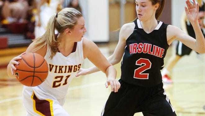 Ursuline's Maggie Connolly (2) pressures Sarah Metz of St. Elizabeth on Feb. 9. The Raiders are the No. 1 seed in the upcoming DIAA Girls Basketball Tournament.