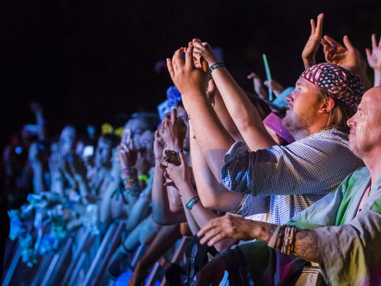 Fans cheer as Florence and The Machine perform on the