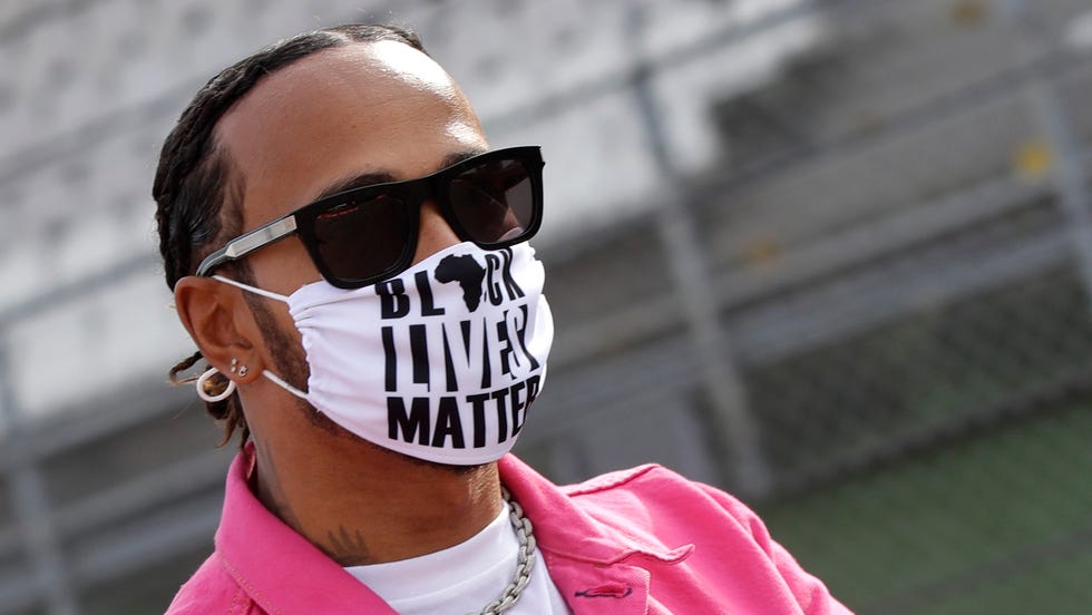 Lewis Hamilton wears a "Black Lives Matter" mask ahead of a 2020 race.