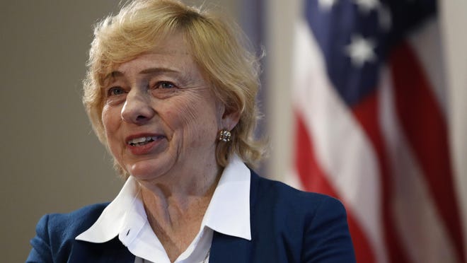 Gov. Janet Mills speaks to reporters before signing papers to posthumously pardon Don Gellers, a Passamaquoddy tribal lawyer convicted of marijuana possession, Tuesday, Jan. 7, 2020, at the Statehouse in Augusta, Maine.