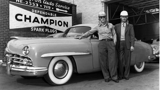 Raymond Parks (R) with driver Red Byron, who won his first NASCAR stock car championship in 1949 driving one of Parks' cars.