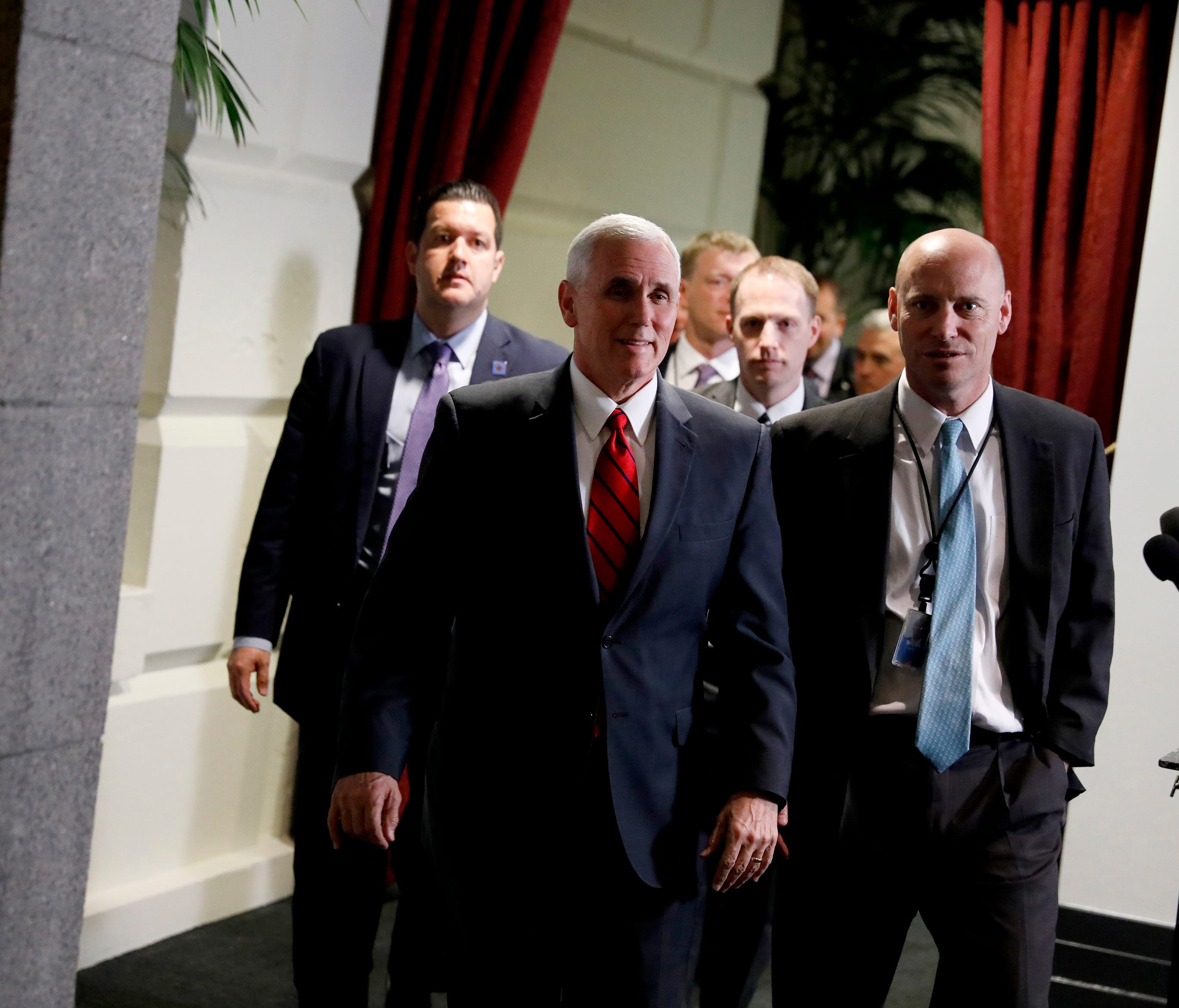Pence departs after a meeting with House Republicans on health care legislation on Capitol Hill on April 4, 2017.