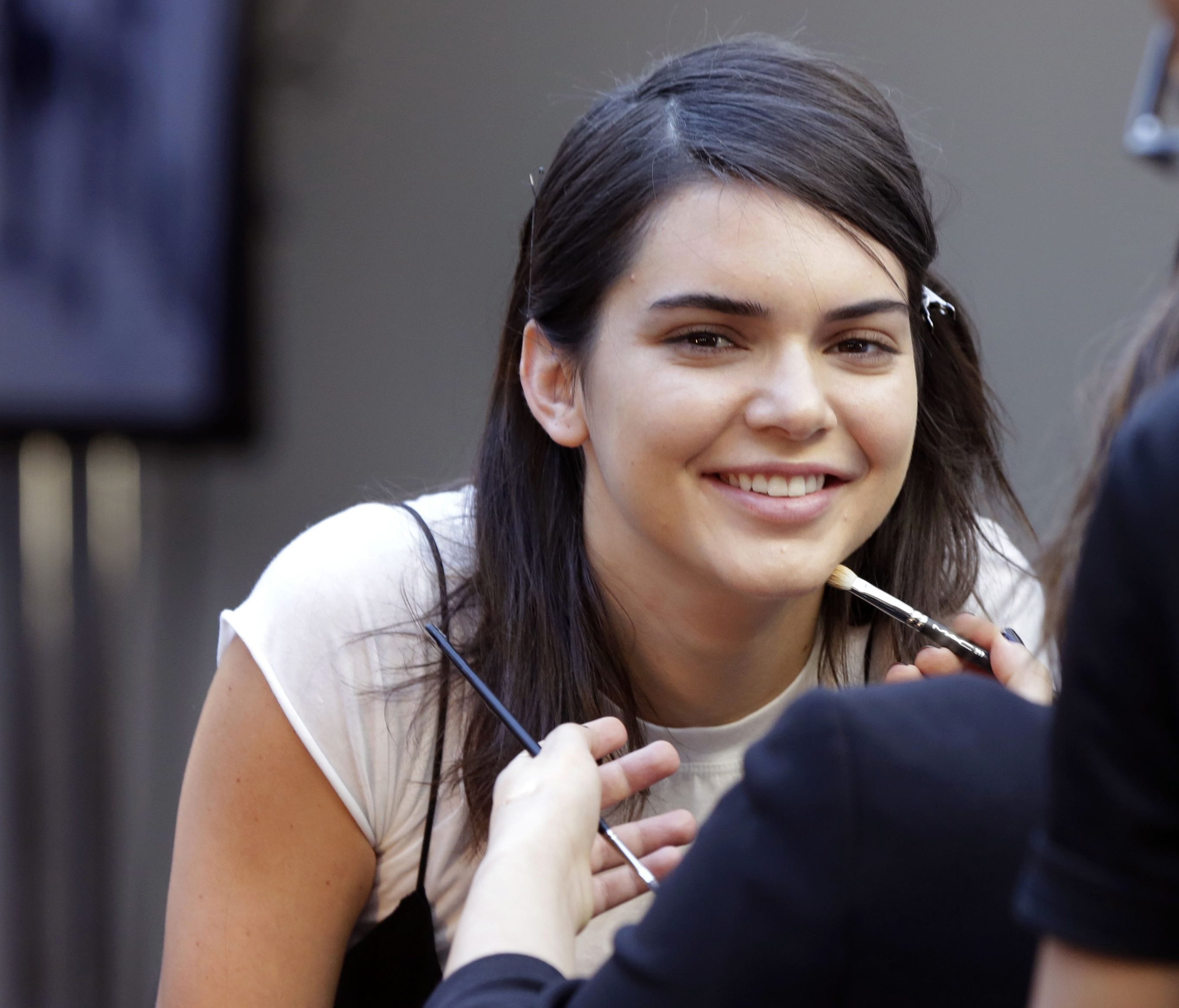 Model Kendall Jenner's Pepsi ad is being taken off the air. Here she is getting makeup for a modeling session.