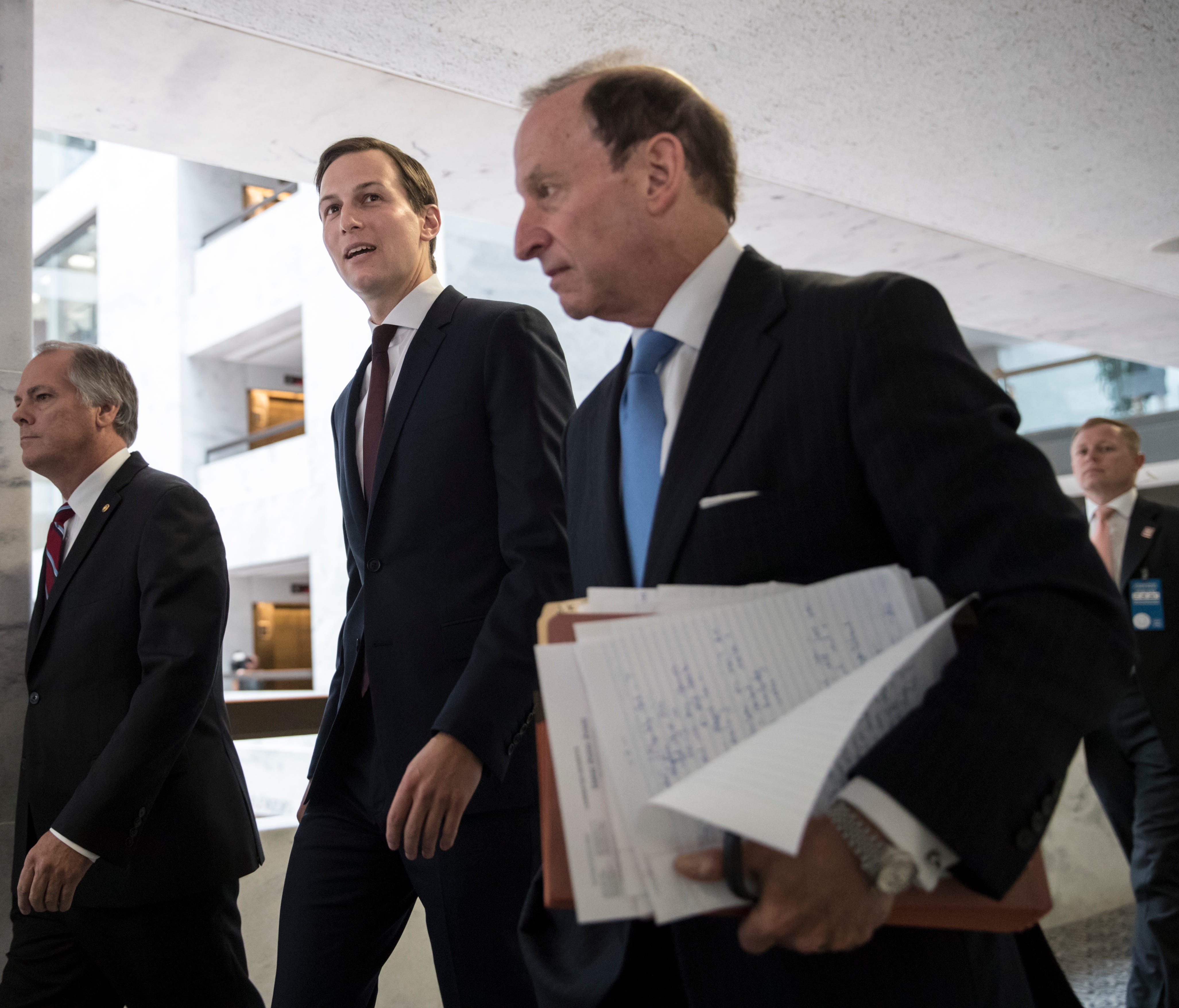White House senior adviser Jared Kushner, center, and his attorney Abbe Lowell, right, depart Capitol Hill in Washington, Monday, July 24, 2017, after a closed-door interview with Senate Intelligence Committee investigators looking into Russia's elec