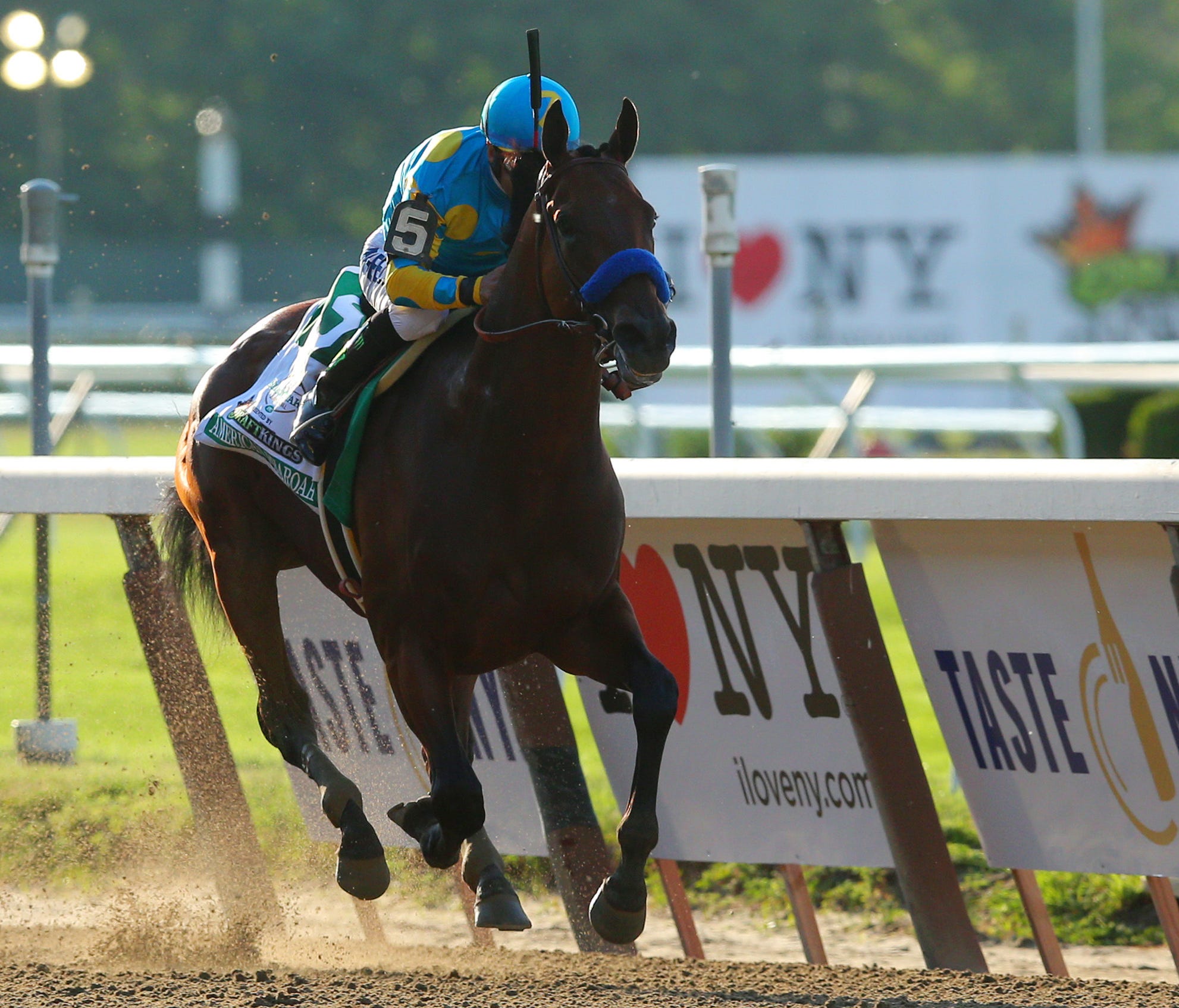 American Pharoah with Victor Espinoza wins the 2015 Belmont Stakes at Belmont Park.