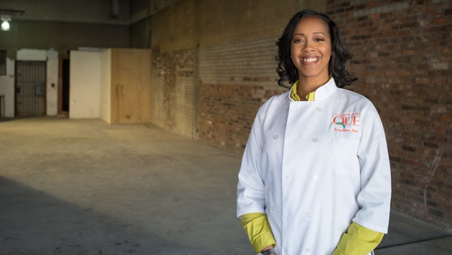 Quiana Borden, owner of The Kitchen by Cooking With Que, provides plant-based healthy food options with a choice of meat additions in her Midtown restaurant.
