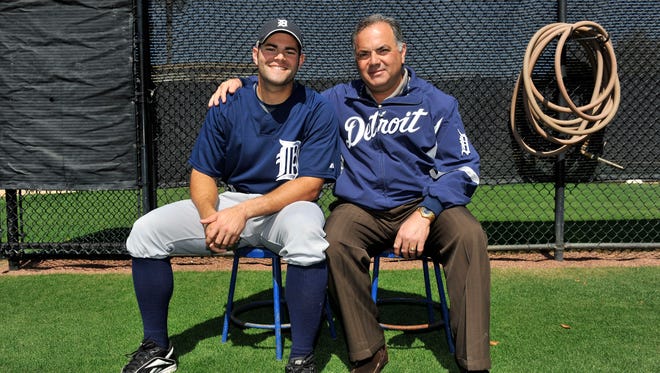 Alex Avila, then 22, a non-roster invitee to Tigers spring training camp, and his father Al Avila, then the Tigers' vice-president and assistant general manager, sit together in spring training in 2009.