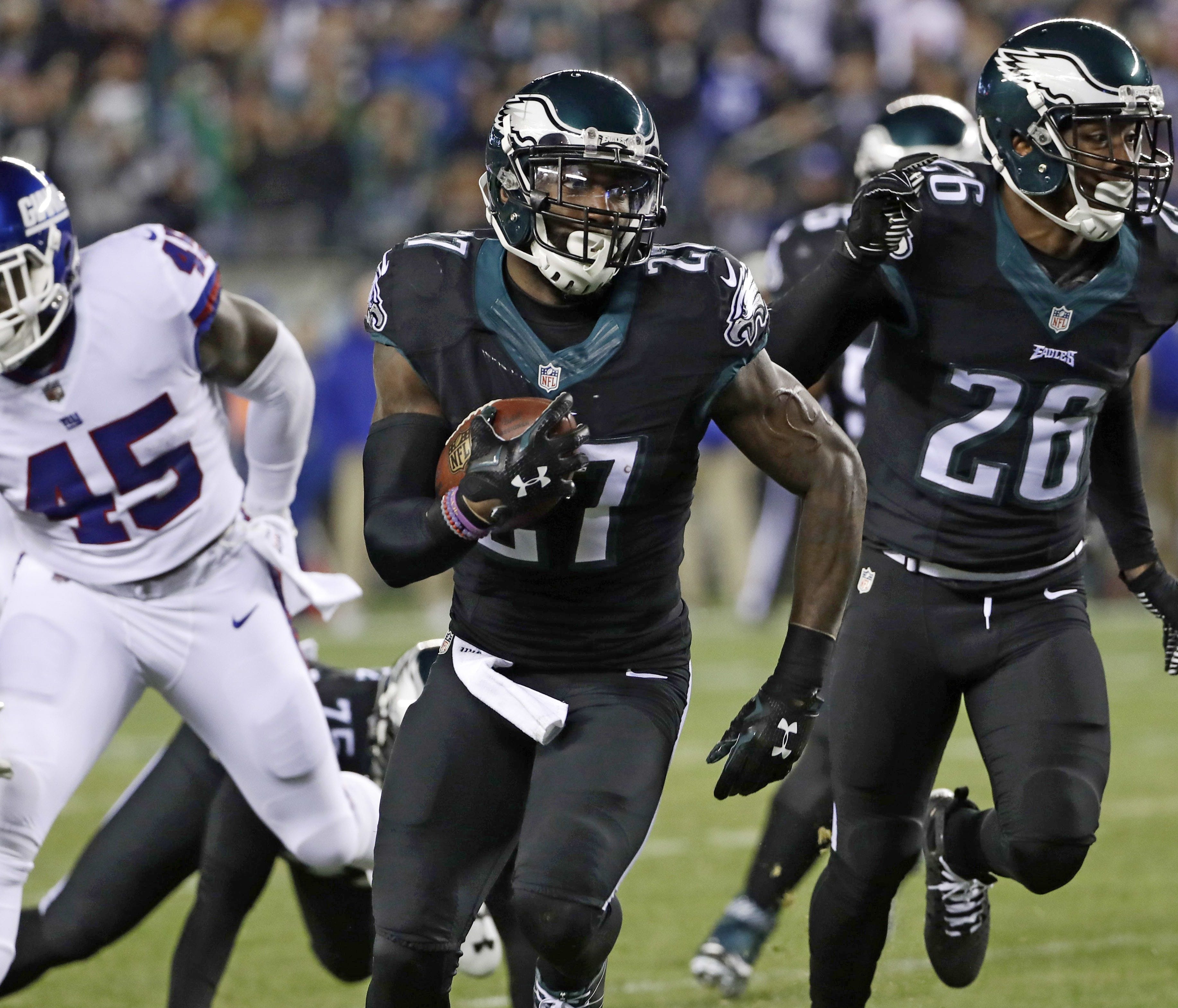 Philadelphia Eagles' Malcolm Jenkins (27) runs for a touchdown after intercepting a pass during the first half of an NFL football game against the New York Giants, Thursday, Dec. 22, 2016, in Philadelphia. (AP Photo/Michael Perez)