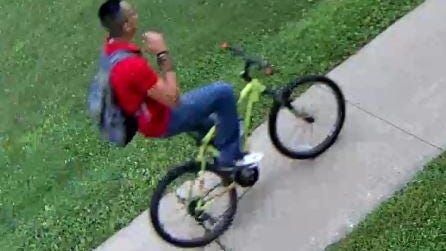 Police are seeking this man who was videotaped riding away from the Hatchery Hill School.