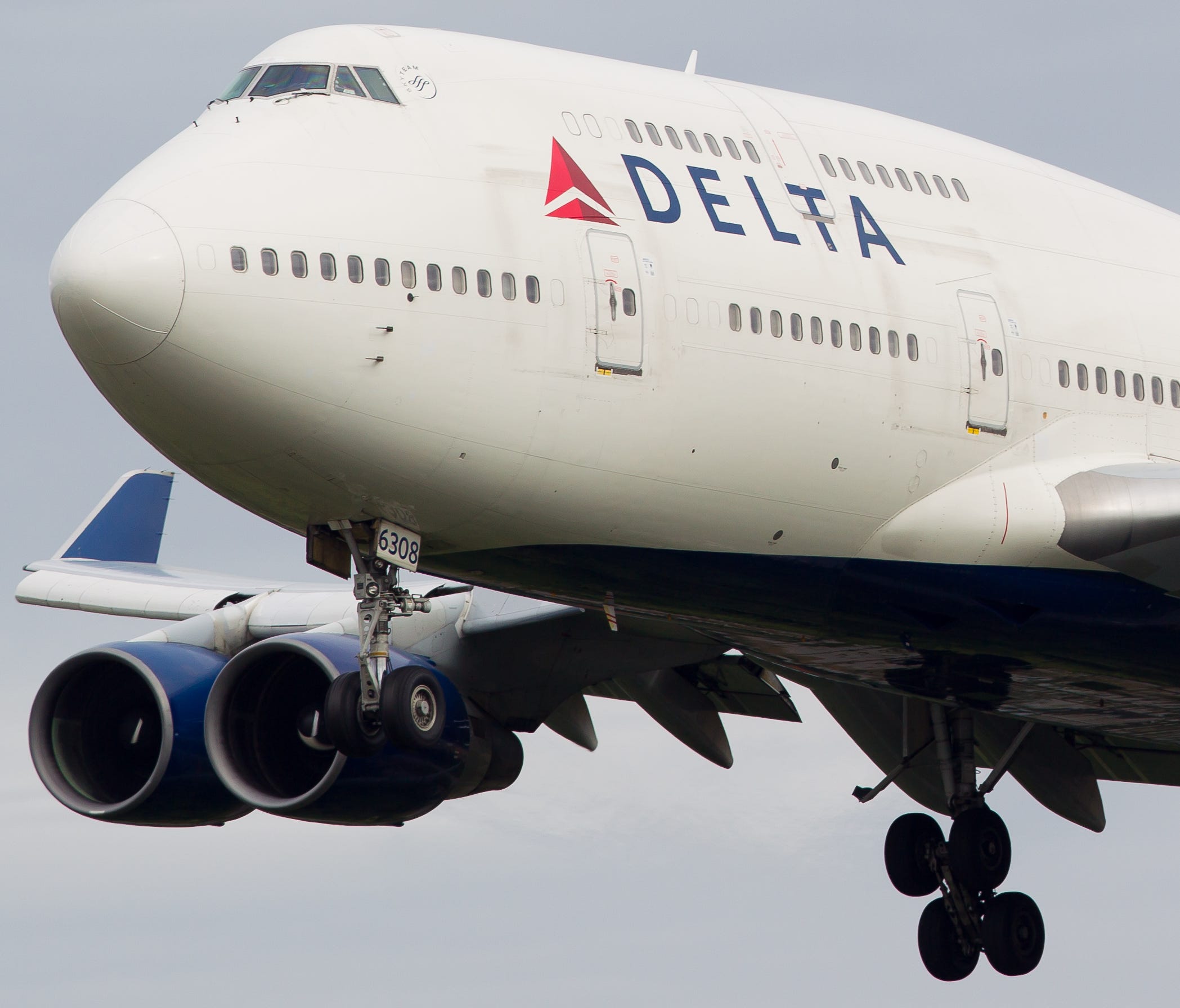 A Delta Air Lines Boeing 747-400 jet is seen in flight in June 2016.