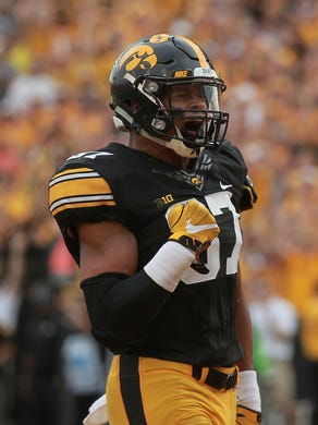 Iowa tight end Noah Fant celebrates as he runs in for a touchdown during the Hawkeyes' game against North Texas at Kinnick Stadium on Saturday, Sept. 16, 2017.