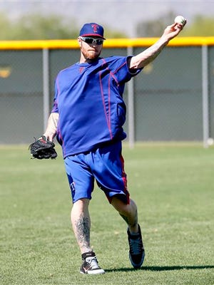 Texas Rangers baseball player Josh Hamilton works out at the Rangers' training facility, Tuesday, April 28, 2015, in Surprise, Ariz.