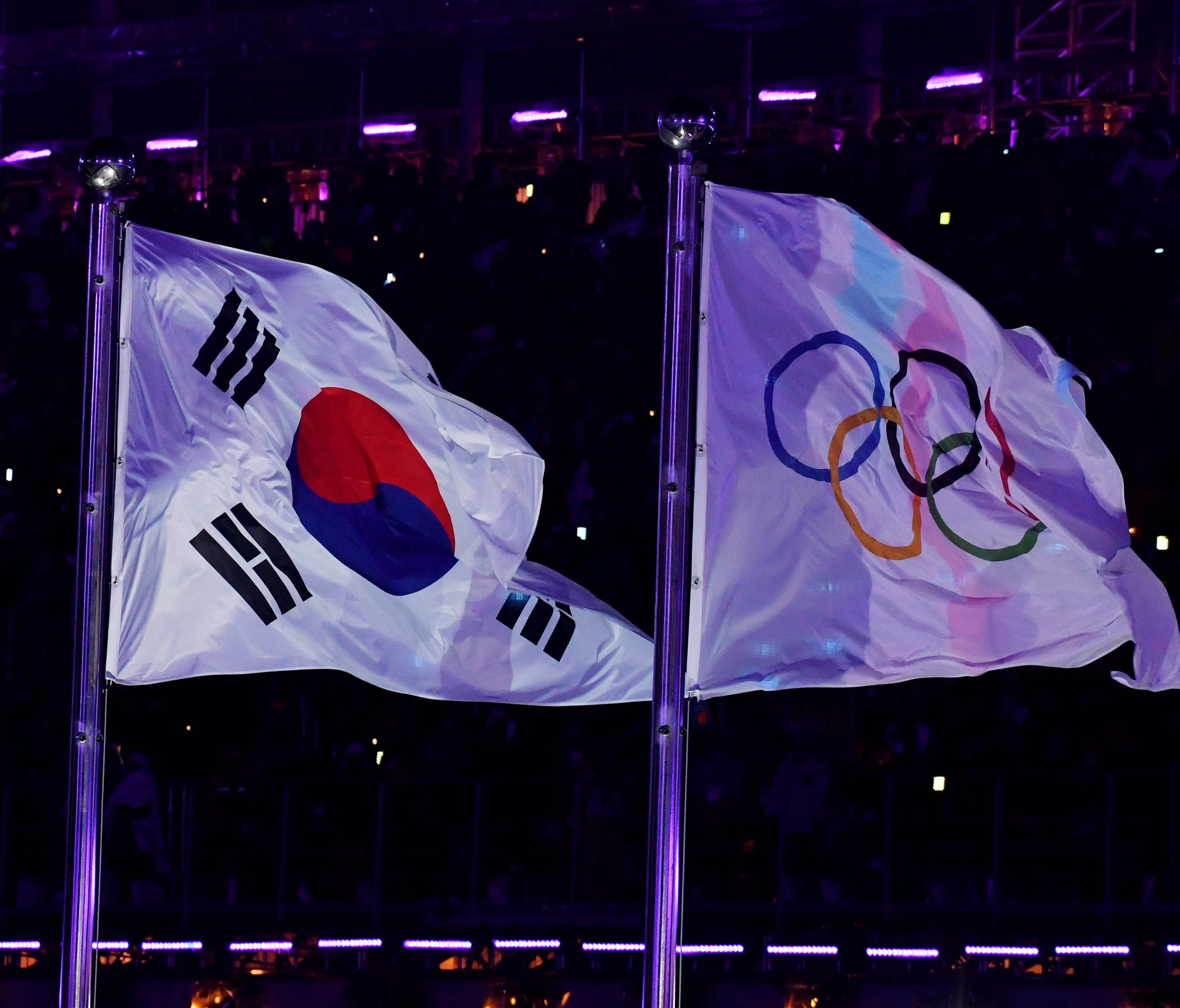 The Olympics flag is raised during the Opening Ceremony for the Pyeongchang 2018 Olympic Winter Games.
