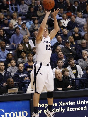 Former Xavier guard Brad Redford puts up a three-pointer against St. Bonaventure in January of 2012.