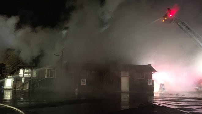 Firefighters are battling an early morning blaze Wednesday at the Wayside Tavern in Fond du Lac.