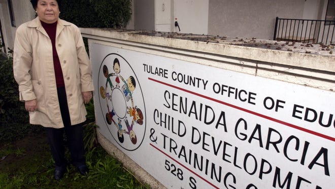 Senaida Garcia died on Jan. 23. In this 2004 file photo, she is standing in front of the child care center that was named in her honor in Visalia.