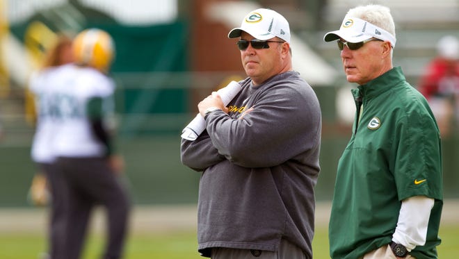 Green Bay Packers coach Mike McCarthy and general manager Ted Thompson watch the team's minicamp in this 2012 file photo.