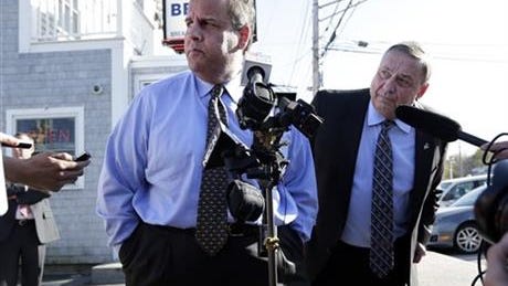 Gov. Chris Christie, left and Maine Gov. Paul LePage take questions from reporters outside Becky's Diner on May 7, 2014, in Portland, Maine. (Associated Press)