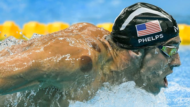 United States swimmer Michael Phelps advanced to the finals of the men's 200-meter butterfly semifinal Monday, August 8, 2016, at the Olympic Aquatics Stadium at the 2016 Summer Olympics Games in Rio de Janeiro, Brazil. Circles on Phelps' body are the result of his use of cupping therapy.