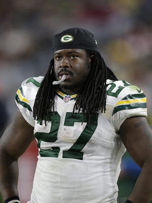 Green Bay Packers running back Eddie Lacy (27) looks on from the sidelines in the fourth quarter against the Arizona Cardinals at University of Phoenix Stadium.
