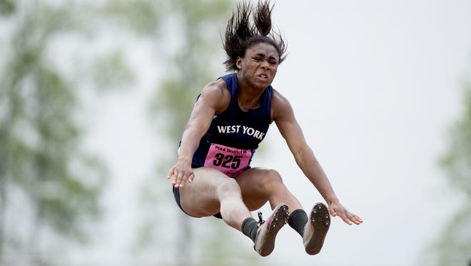 West York's Tesia Thomas competes in the Class AAA triple jump at the District III track and field championships held at Shipppensburg University, Friday, May 18, 2018.