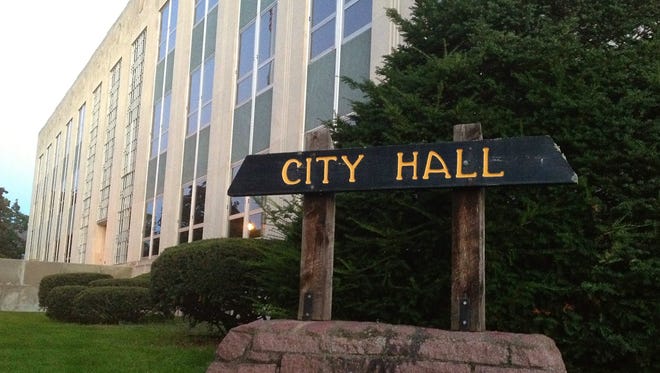 Moody's Investors Service has lowered Wausau's credit rating as the city takes on more debt to fund projects.