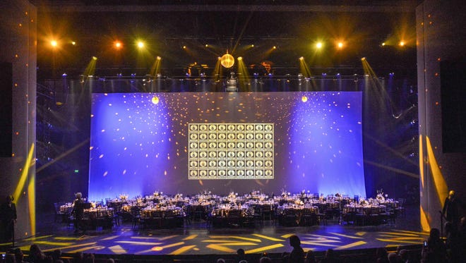 The glittering stage with dinner seating.