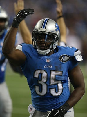 Detroit Lions' Joique Bell celebrates after his touchdown against the Chicago Bears during the first half on Thursday, Nov. 27, 2014, at Ford Field in Detroit.