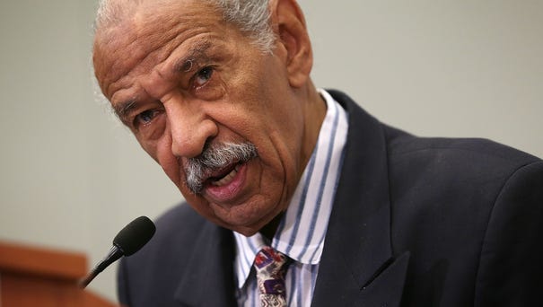 Rep. John Conyers, D-Mich., speaks at a session...