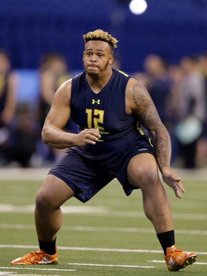 Temple offensive lineman Dion Dawkins runs a drill at the NFL football scouting combine in Indianapolis, March 3, 2017.
