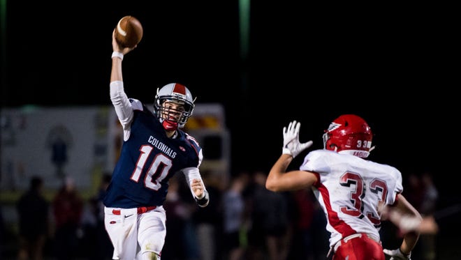 New Oxford's quarterback Brayden Long (10) passes against Bermudian Springs on Friday, September, 1, 2017. The Colonials fell to the Eagles 25-10.