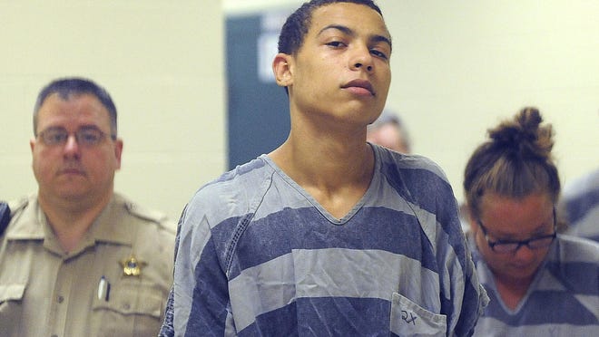 David Randle, 20, is escorted into Minnehaha Country Court on Tuesday in Sioux Falls.