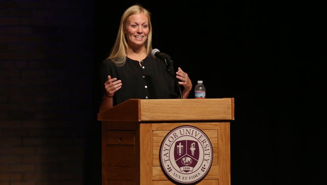 Whitney (Cerak) Wheeler addresses a crowd during a chapel service at Rediger Chapel/Auditorium on the Taylor University campus April 27. Wheeler's address was the third of three public events held at Taylor to observe the 10th anniversary of the April 26, 2006, crash that claimed the lives of five people -- four students and a staff member
-- from Taylor.