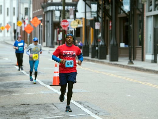 PeeJay Alexander runs down S. Central St. in the Old
