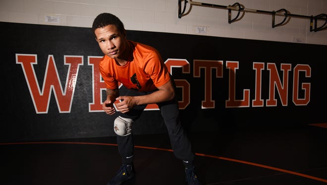 New Lexington's Dimitri Williams is riding a 31-0 streak into the state wrestling tournament this week.