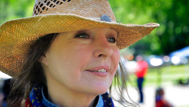 Jennifer O'Neill at her Horses for Heroes event for wounded veterans at Hillenglade Farm. July, 4, Nashville, Tenn.