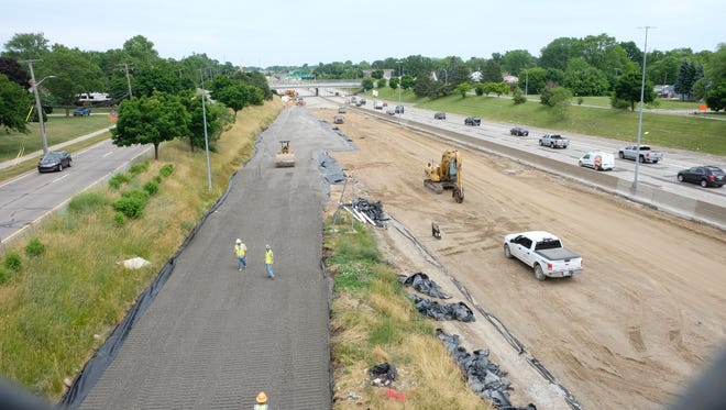 Michigan Department of Transportation officials held a press conference Tuesday, June 19, 2018, in Roseville and announced that freshly laid pavement on I-696 near Gratiot had to be removed due to a common equipment issue. (Sarah Rahal / The Detroit News)