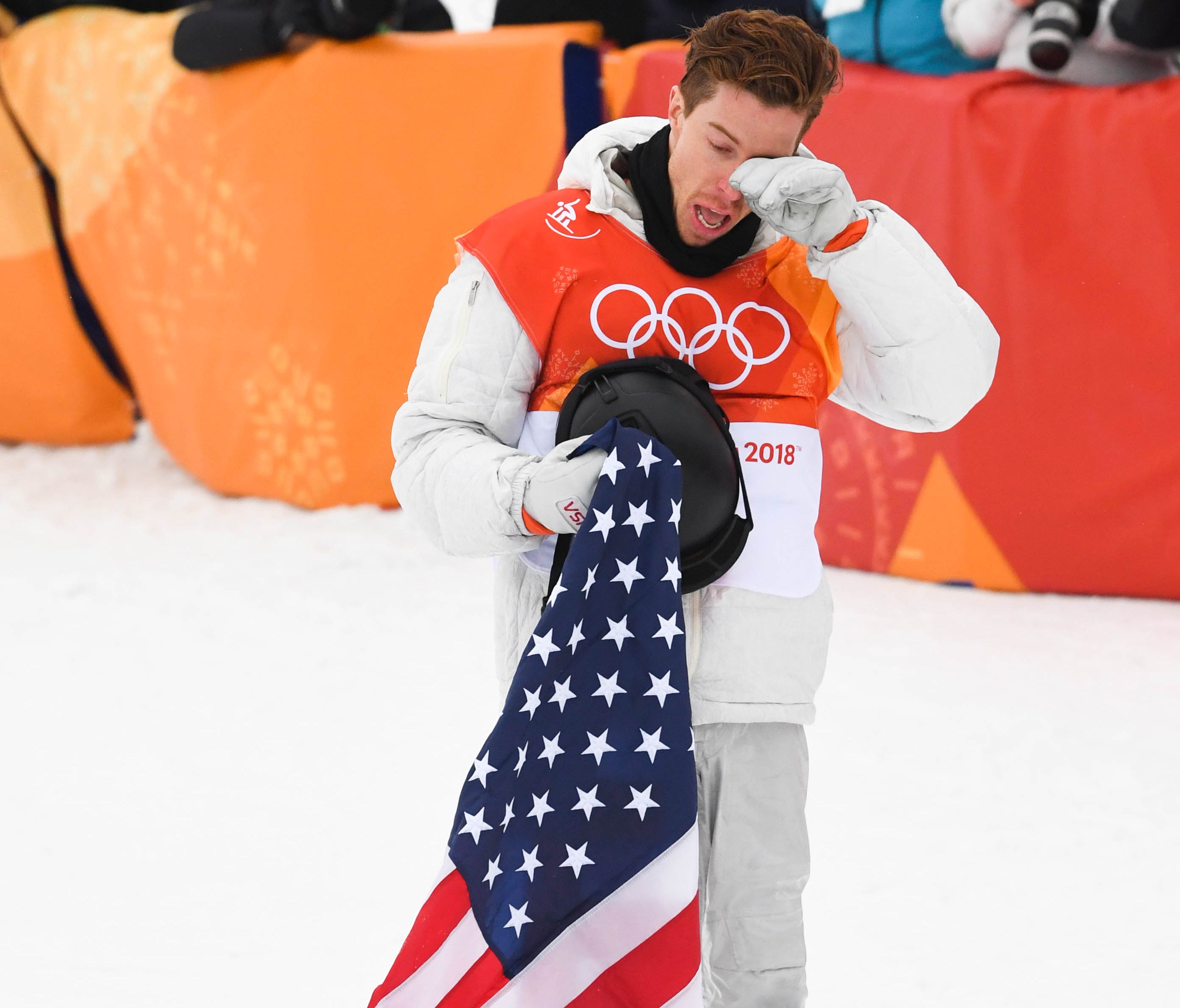 Shaun White of the USA  celebrates his victory gold in snowboard halfpipe.