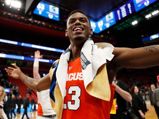 Syracuse Orange guard Frank Howard (23) celebrates