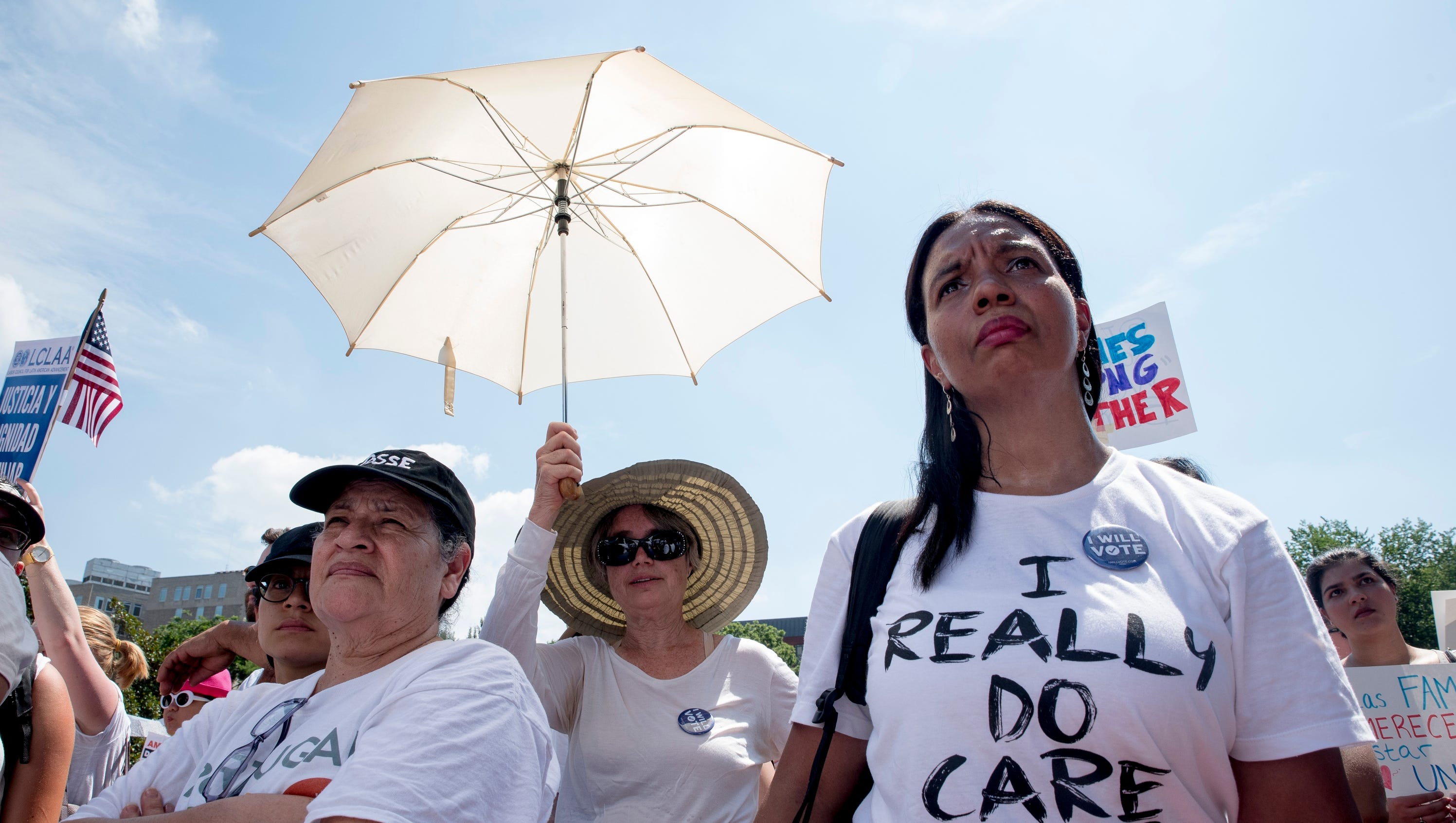 People gather for the Families Belong Together rally
