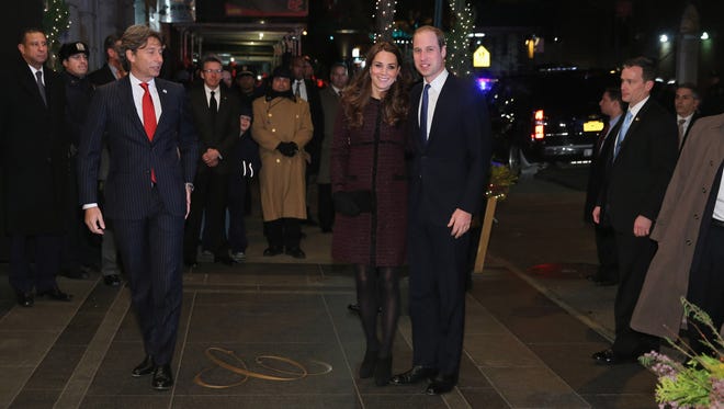 Prince William, Duke of Cambridge and Catherine, Duchess of Cambridge (L) arrive at The Carlyle Hotel, where they will be staying during their official two-day visit to the United States, on December 7, 2014 in New York City.